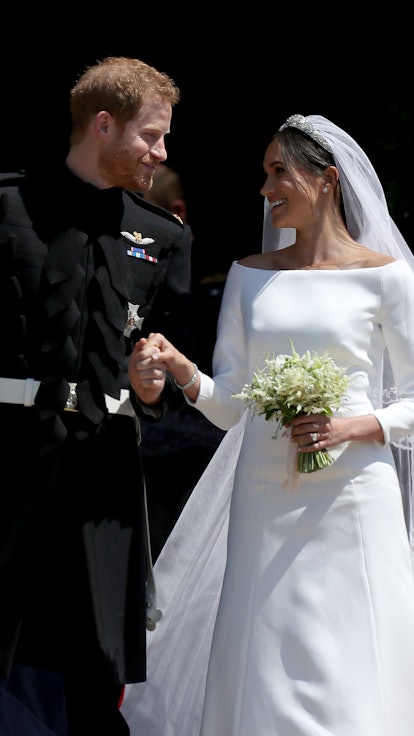 Prince Harry and Meghan Markle leave St George's Chapel in Windsor Castle after their wedding. (Phot...