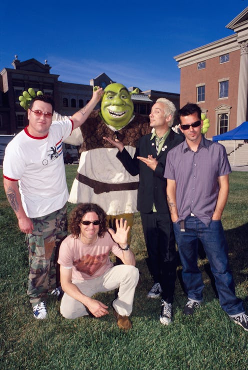 Steve Harwell, Paul De Lisle, Michael Urbano and Greg Camp of Smash Mouth with Shrek (Photo by Annam...