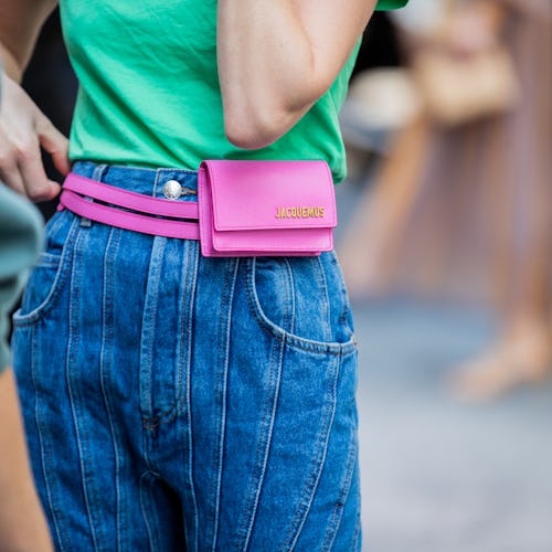 NEW YORK, NEW YORK - SEPTEMBER 09: Thora Valdimars is seen wearing denim jeans, pink Jacquemus fanny...