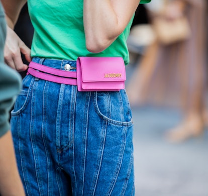 NEW YORK, NEW YORK - SEPTEMBER 09: Thora Valdimars is seen wearing denim jeans, pink Jacquemus fanny...