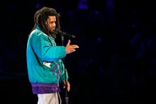 CHARLOTTE, NORTH CAROLINA - FEBRUARY 17: Rapper J. Cole performs during halftime of the 68th NBA All...