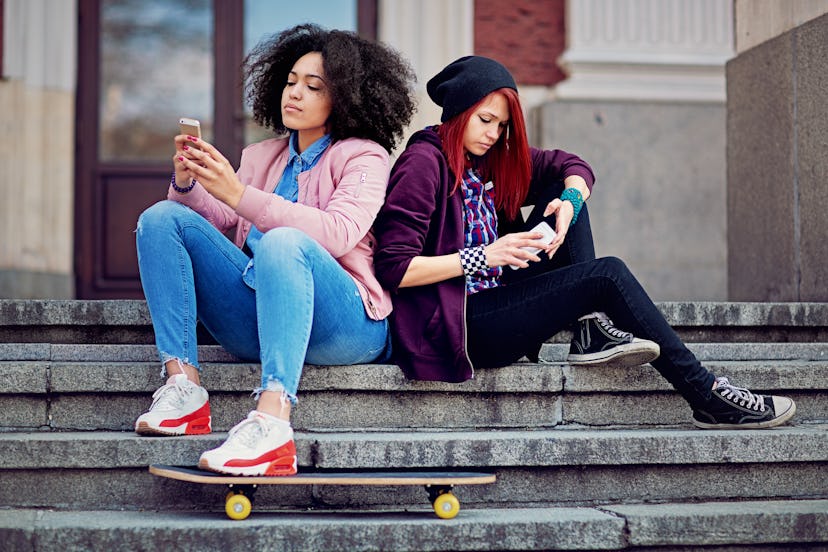 Girlfriends in conflict are texting and sulking each other