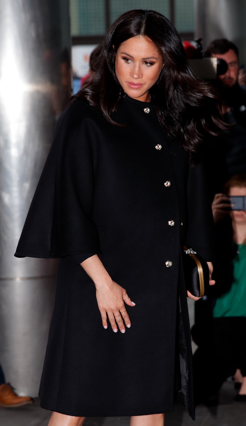 Meghan Markle wore a flattering swing coat.