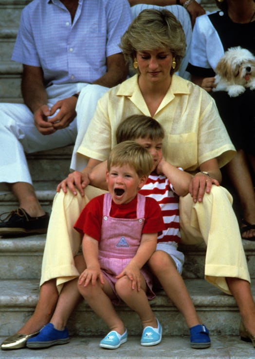 PALMA, MAJORCA - AUGUST 10: Diana, Princess of Wales, wearing a yellow jumpsuit, Prince William and ...