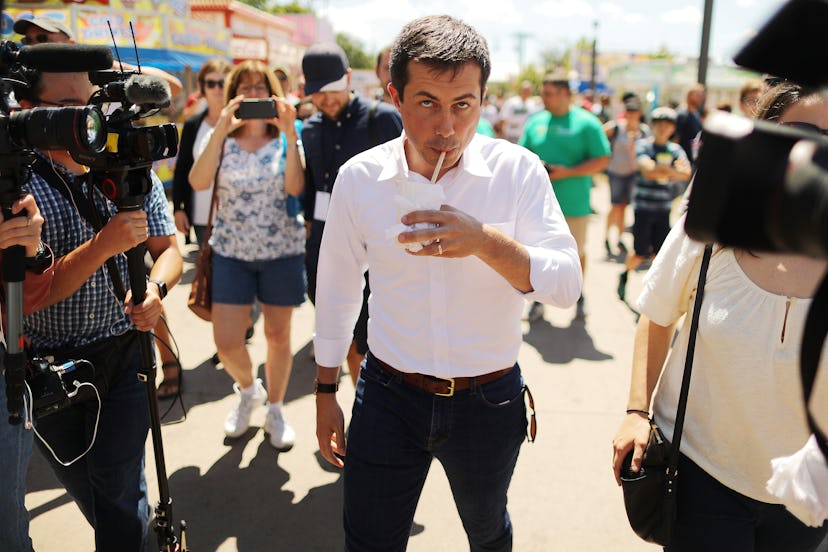 Sec. Pete Buttigieg drinks a root beer float at the Iowa State Fair.