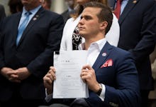 UNITED STATES - April 21: Rep. Madison Cawthorn, R-N.C., holds up a copy of the Max Pressure Act bil...