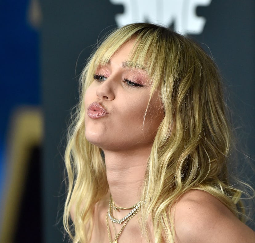 LOS ANGELES, CALIFORNIA - APRIL 22: Miley Cyrus attends the World Premiere of Walt Disney Studios Mo...