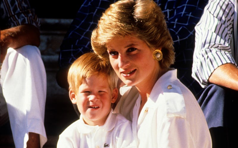 PALMA, MAJORCA - AUGUST 13:  Prince Harry sits on the lap of his mother, Diana, Princess of Wales, w...