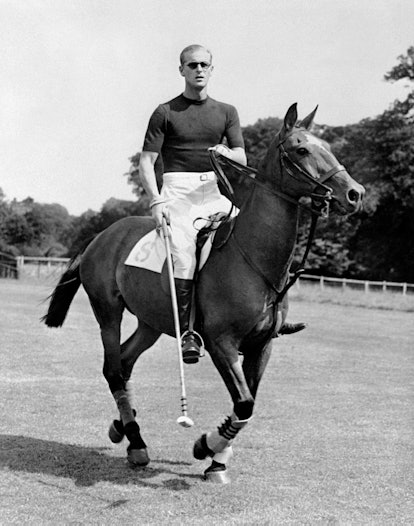 Prince Philip playing polo.
