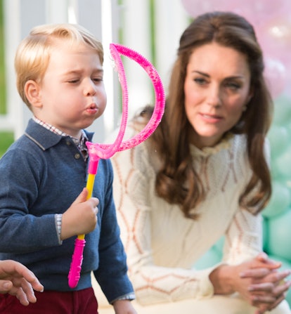Prince George had fun at a children's party. 