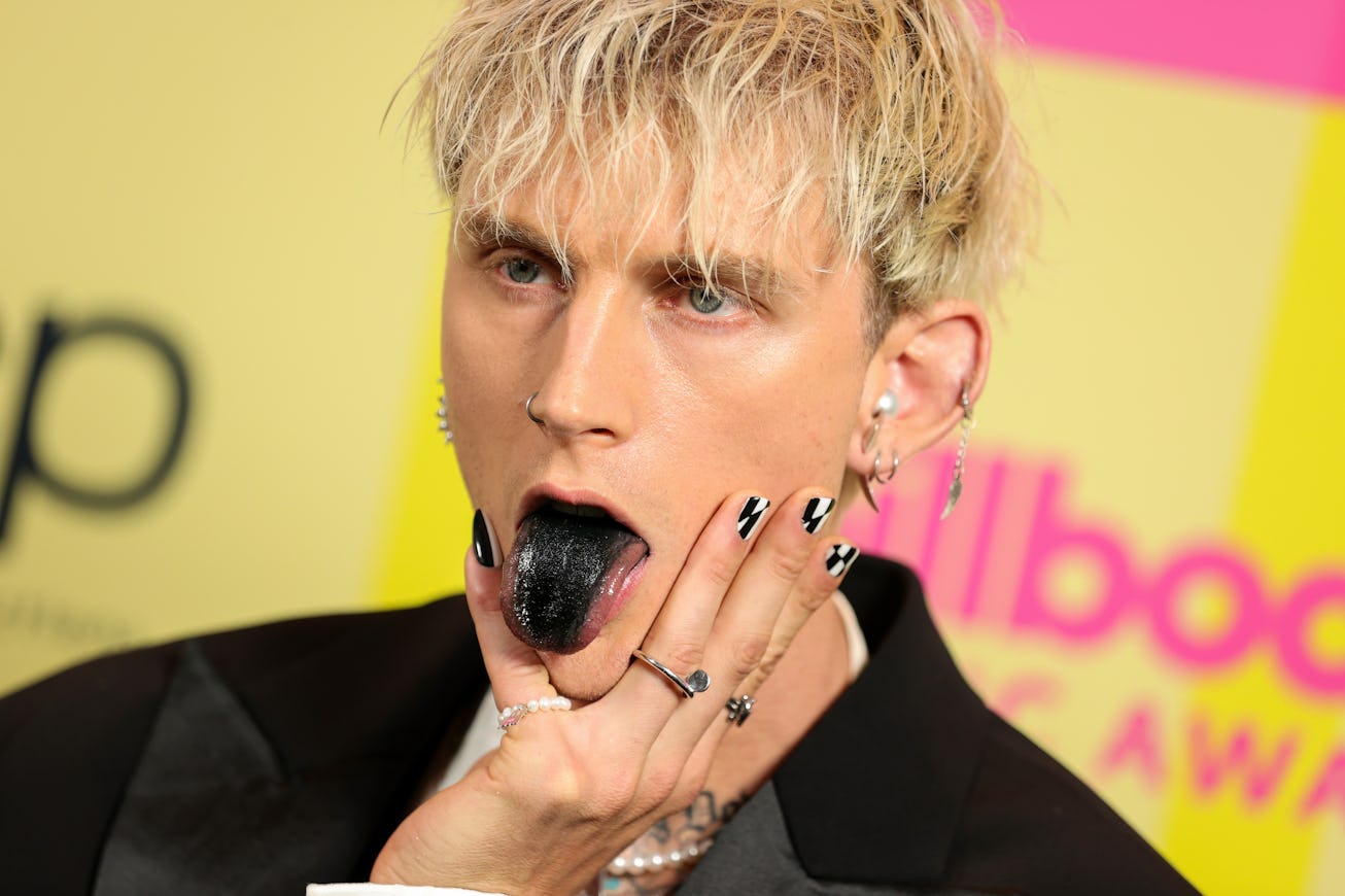 LOS ANGELES, CALIFORNIA - MAY 23: Machine Gun Kelly poses backstage for the 2021 Billboard Music Awa...