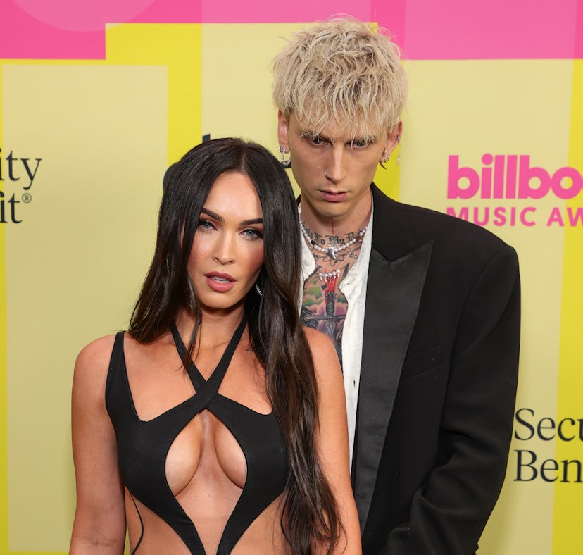 LOS ANGELES, CALIFORNIA - MAY 23: Machine Gun Kelly and Meghan Fox poses backstage for the 2021 Bill...