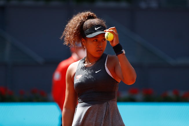 MADRID, SPAIN - MAY 02: Naomi Osaka of Japan looks on during her Women's Singles match, second round, against Karolina Muchova of Czech Republic on the WTA 1000 - Mutua Madrid Open 2021 at La Caja Magica on May 2, 2021 in Madrid, Spain (Photo by Oscar J. Barroso / Europa Press Sports via Getty Images)