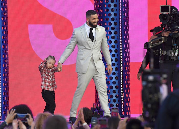 LOS ANGELES, CALIFORNIA - MAY 23: (L-R) Adonis Graham and Drake, winner of the Artist of the Decade ...