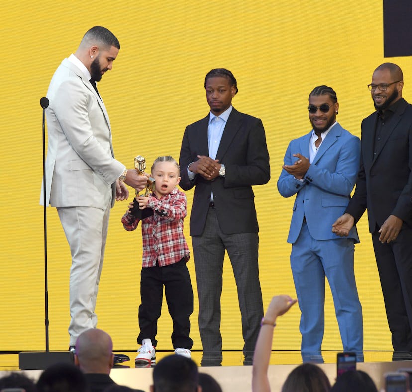 Drake brought son Adonis on stage as he accepted his BBMA for Artist of the Decade.