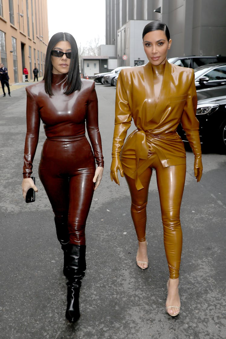 PARIS, FRANCE - MARCH 01: (EDITORIAL USE ONLY) Kourtney and Kim Kardashian attend the Balenciaga sho...