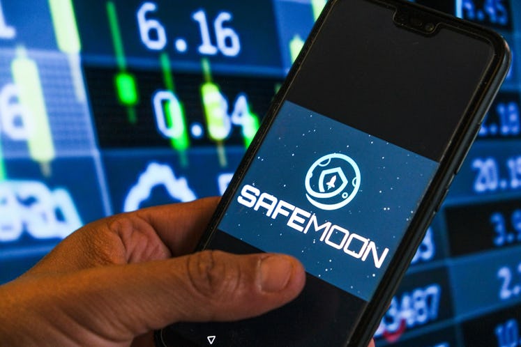 SafeMoon logo trading on smartphone