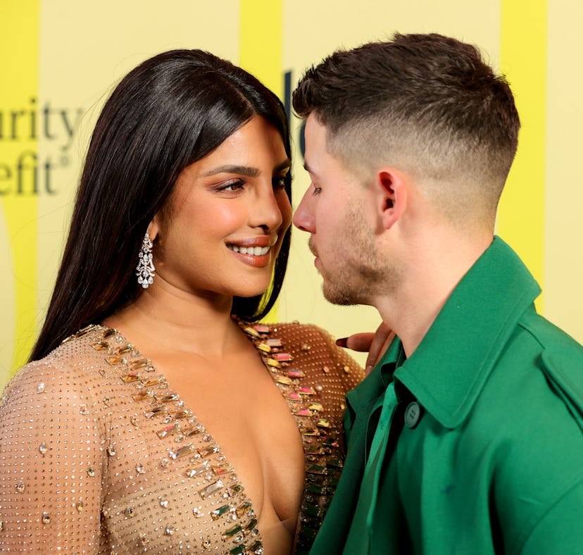 Nick Jonas and Priyanka Chopra shared a sweet kiss on the 2021 BBMAs red carpet.