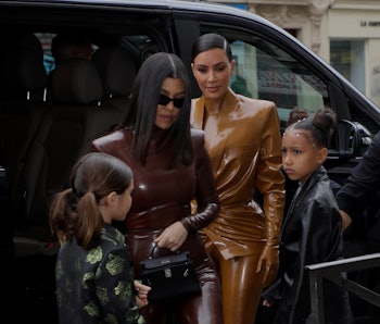 PARIS, FRANCE - MARCH 01: Kourtney Kardashian her daughter Penelope Disick, Kim Kardashian and her d...