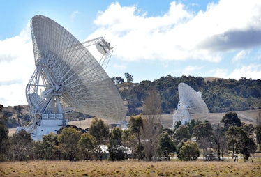 A general view shows a 70 metre dish (L) and 34metre dish (R) that are tracking NASA's Mars science ...
