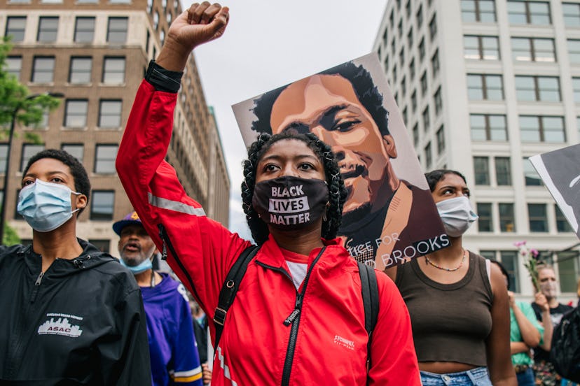 MINNEAPOLIS, MINNESOTA - MAY 23: People march during an inaugural remembrance demonstration for Geor...