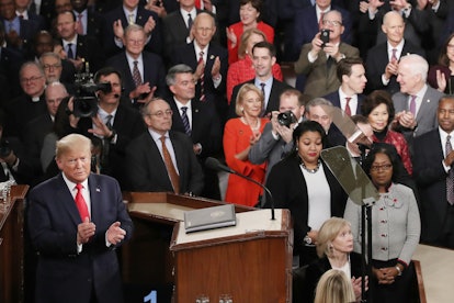 President Donald Trump steps to the lectern for the State of the Union address in the chamber of the...