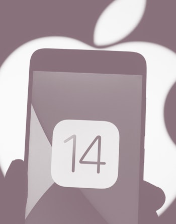 UKRAINE - 2020/10/14: In this photo illustration the iOS 14 logo of the iOS mobile operating system ...