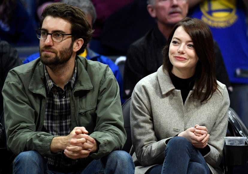 Emma Stone and Dave McCary attend the Golden State Warriors and Los Angeles Clippers basketball game...