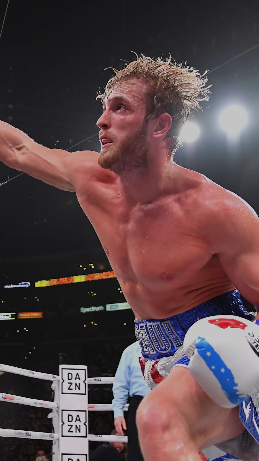 LOS ANGELES, CA - NOVEMBER 09: Logan Paul (red/white/blue shorts) and KSI (black/red shorts) exchang...