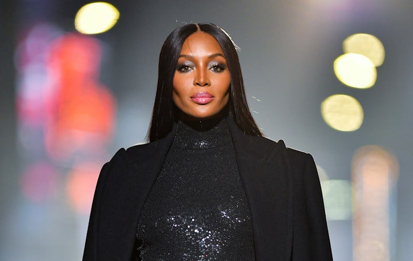 Naomi Campbell shows true celebrity Gemini energy while walking in Michael Kors Fashion Show.