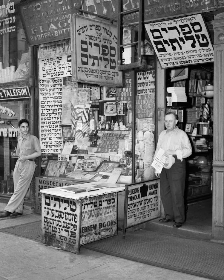 1940s LOWER EAST SIDE SHOP SIGN FOR FLAGS BOOKS BADGES BUTTON IN YIDDISH HEBREW ALPHABET MANHATTAN N...