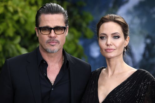 Brad Pitt and Angelina Jolie attending the premiere of Maleficent at Kensington Palace, London. (P...