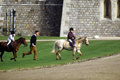 Prince Charles took his sons out to ride their ponies.
