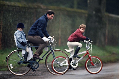 Prince Harry got a lift on the back of his dad's bike.