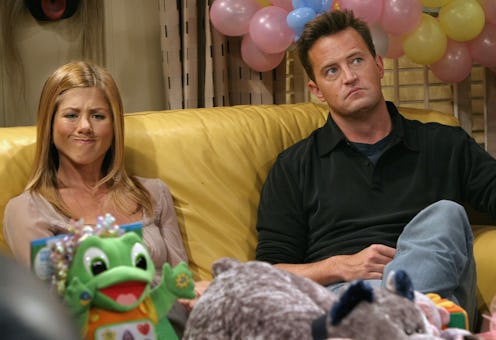 Jennifer Aniston and Matthew Perry in between takes on the set of "Friends" in 2003.