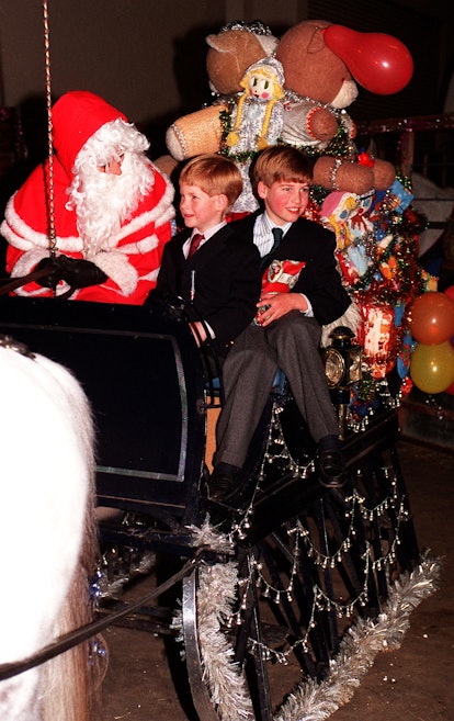 Princes William and Harry visit Santa.