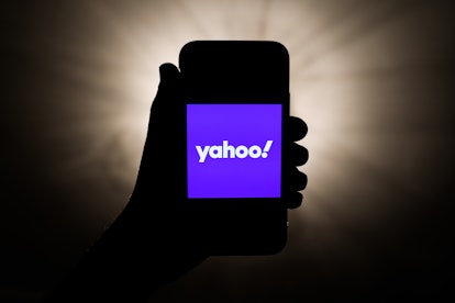 Yahoo! logo is seen displayed on a phone screen in this illustration photo taken in Krakow, Poland o...