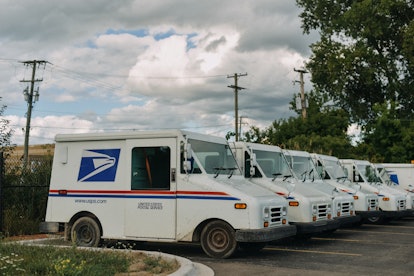 USPS truck parked in line