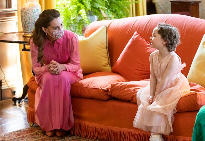 EDINBURGH, SCOTLAND - MAY 27: Catherine, Duchess of Cambridge meets Mila Sneddon, aged five, and her...