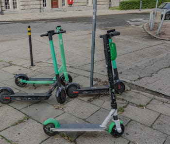 Bolt and Lime electric kick scooters standing at the pavement are  seen in Gdansk, Poland on 5 Septe...