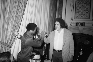 (Original Caption) Ali Meets a Giant. New York: When World Heavyweight Boxing Champion Muahmmad Ali ...