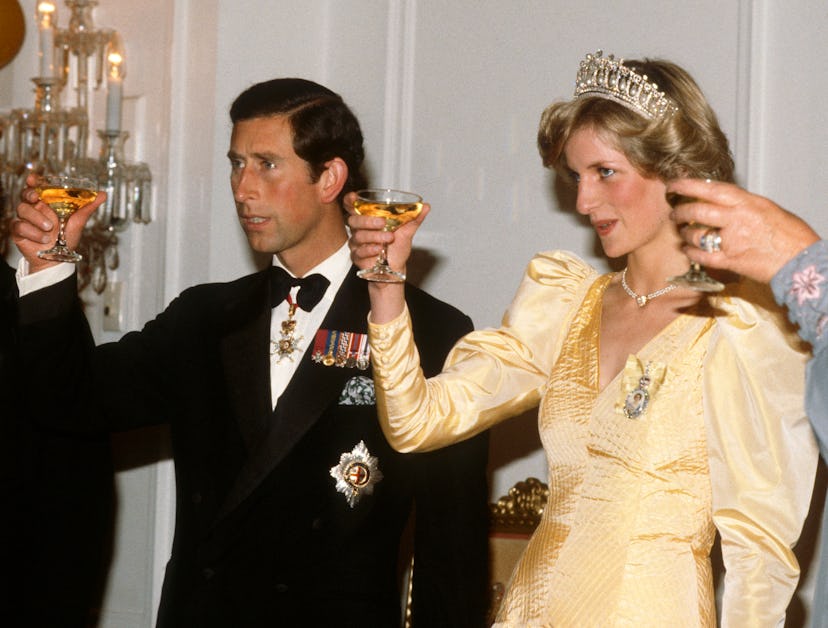 Prince Charles and Princess Diana toast. 