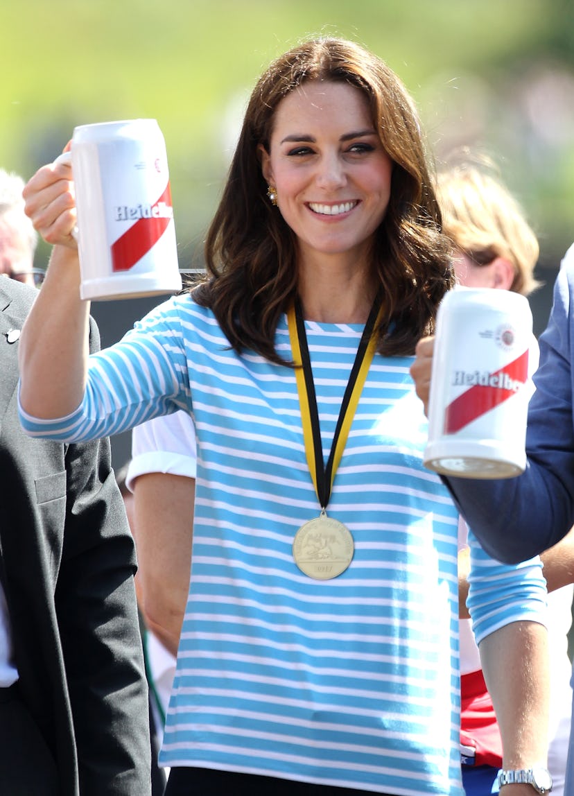 Kate Middleton drinks a beer after a rowing match.