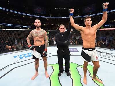 CLEVELAND, OH - SEPTEMBER 10:  (R-L) Mickey Gall celebrates after defeating Phil 'CM Punk' Brooks in...