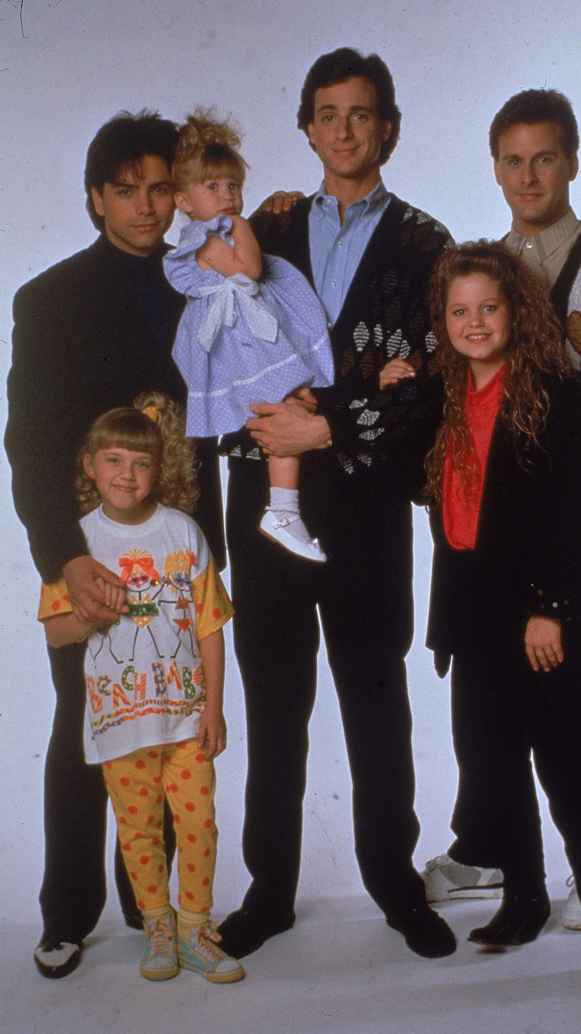 Portrait of the cast of the television program, 'Full House,' (left - right): John Stamos, Jodie Swe...