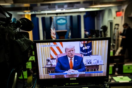 WASHINGTON, DC - JANUARY 13: President Donald J. Trump is seen on a television screen in the briefin...