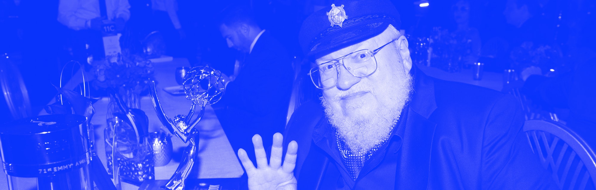 US novelist George R.R. Martin poses with the Emmy for Outstanding Drama Series "Game Of Thrones" du...