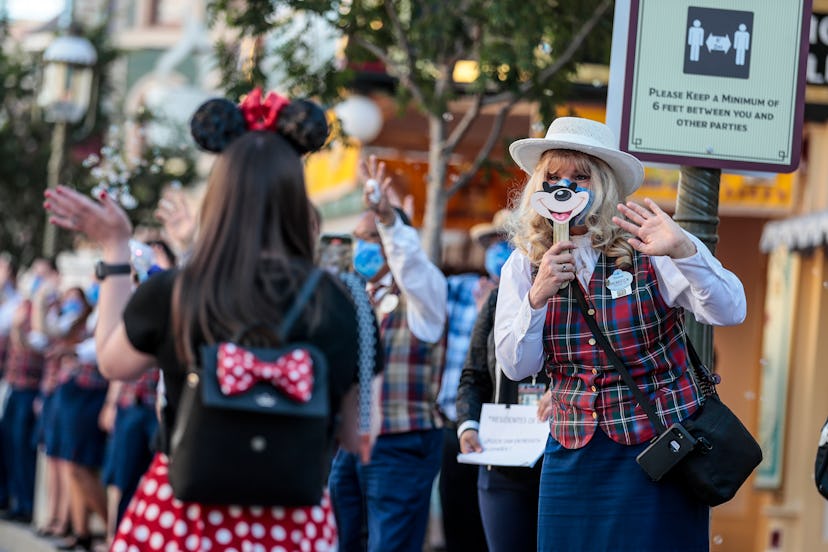 Anaheim, CA, Friday, April 30, 2021 - A limited number of people come to Disneyland the first day af...
