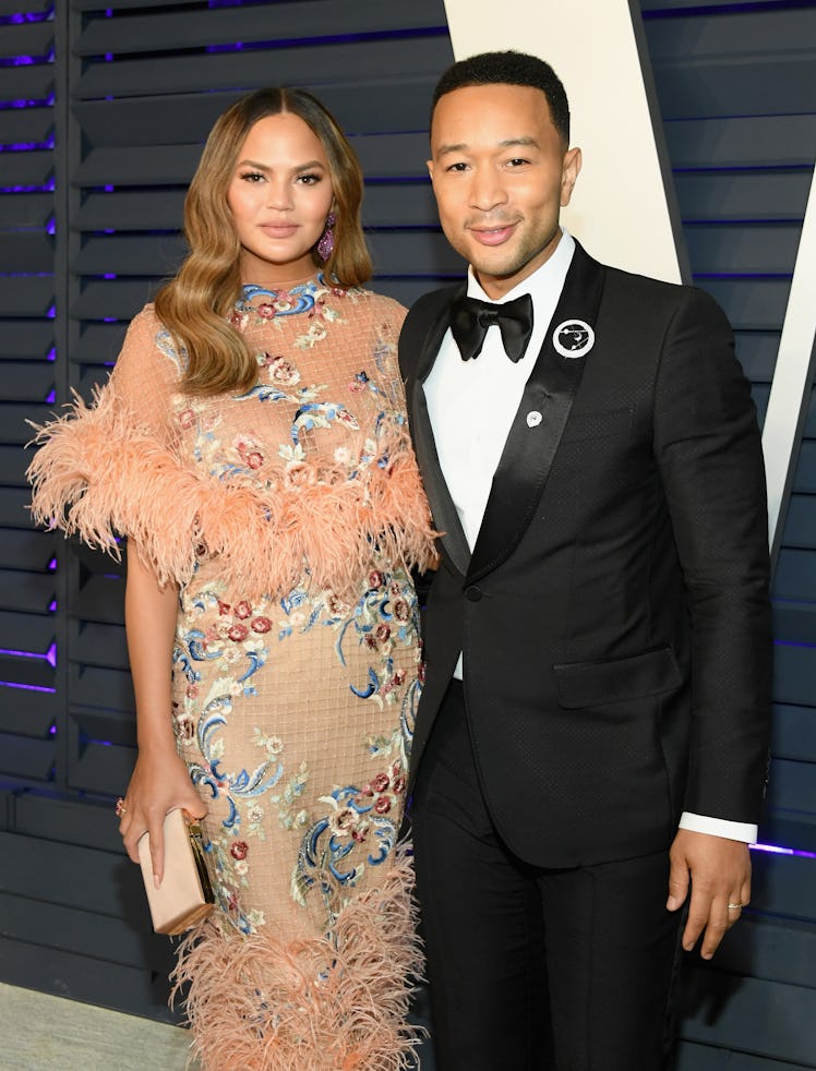 BEVERLY HILLS, CA - FEBRUARY 24: Chrissy Teigen (L) and John Legend attend the 2019 Vanity Fair Osc...