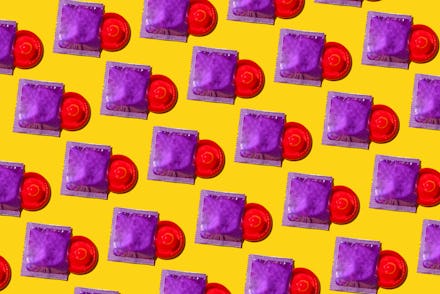 Directly above view of many ready-to-use red condoms on yellow colored background